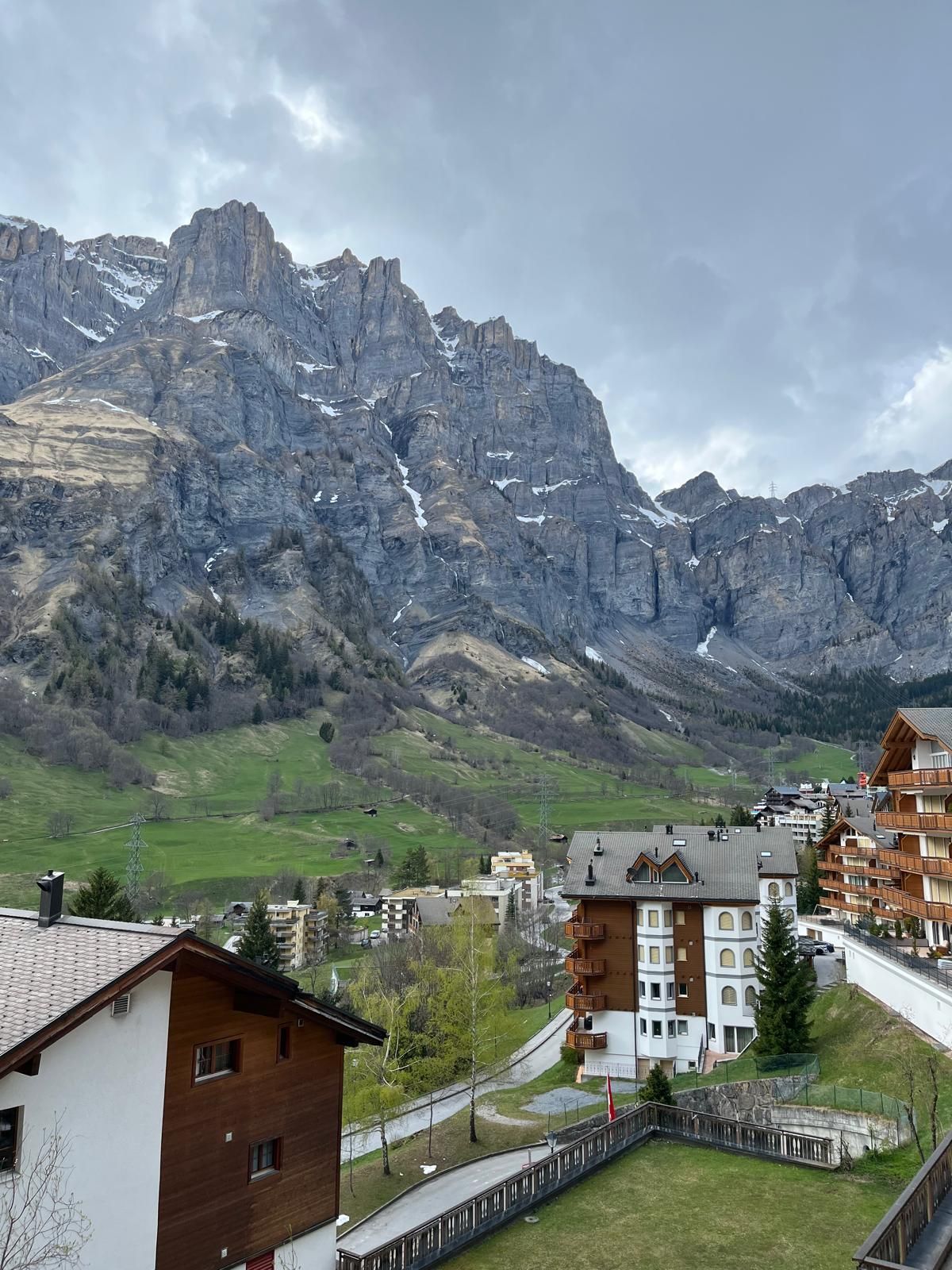 Grey limestone cliffs above Leukerbad in spring